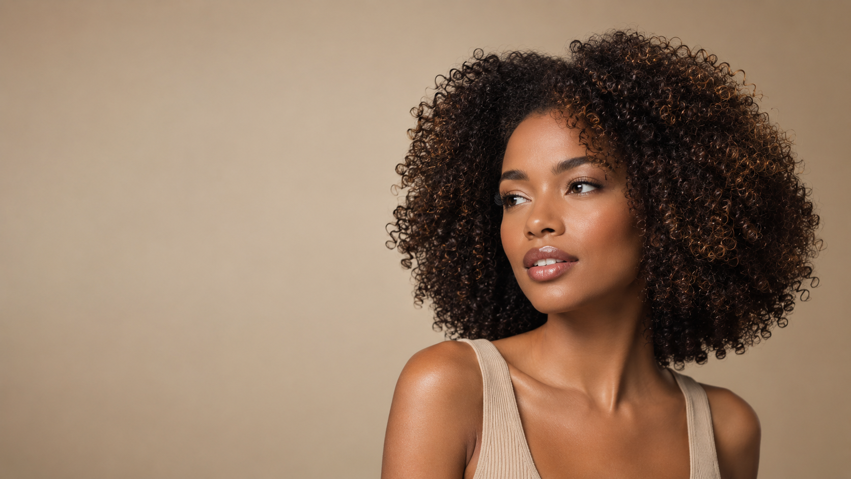 Woman with defined voluminous natural curls